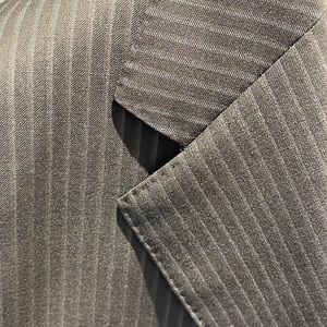 Beautiful pinstripe black suit.